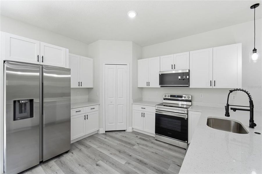 Furnished interior view inside a new home in , Dunnellon (Image 7).