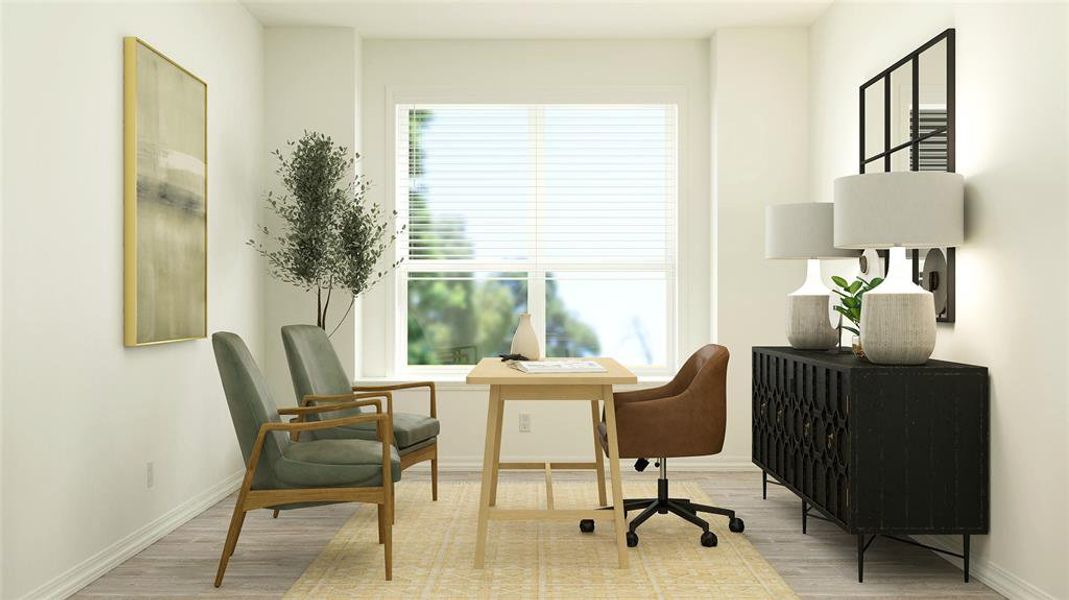 Sitting room with hardwood / wood-style flooring