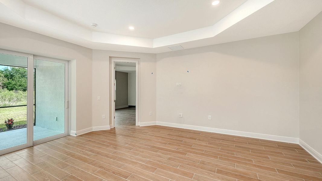 Spacious, unfurnished interior of a new home in Grand Park Real Estate and Homes for Sale in Sarasota, FL - Neal Communities, Sarasota (Image 32).