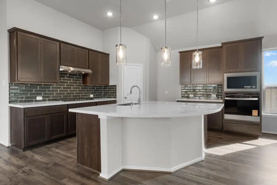 Furnished interior view inside a new home in Dunham Pointe 50', Cypress (Image 8).