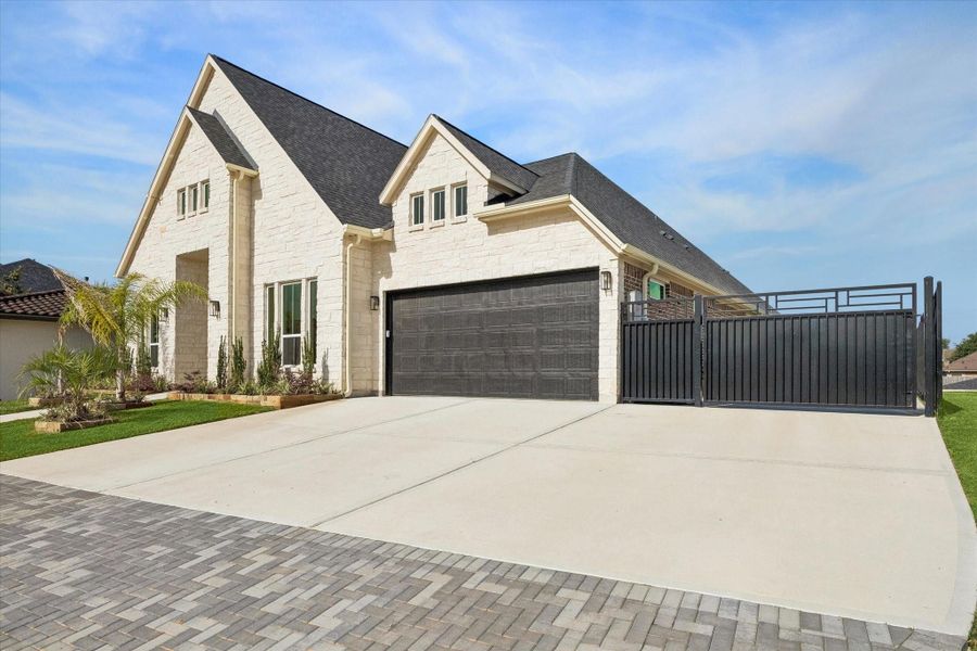 Front exterior of a new home in , Kemah, TX, highlighting curb appeal (Image 22).