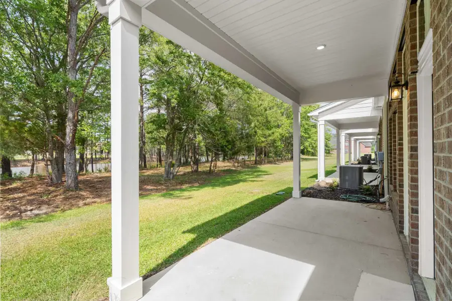 Exterior details and patio area of a home in Long Bay Golf Club, Longs (Image 26). Exterior details and patio area of a home in Long Bay Golf Club, Longs (Image 26).