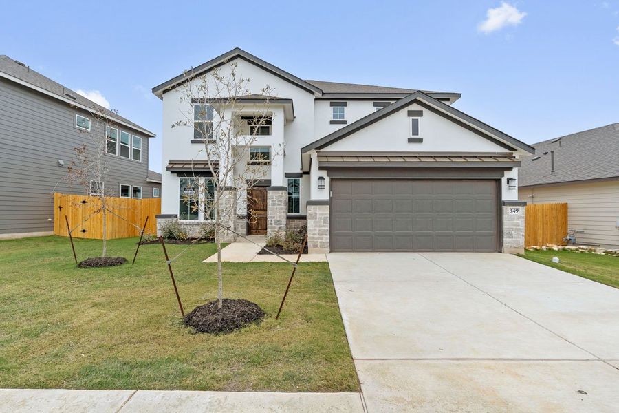 Representative exterior photo of a completed home built from the Lennox 2575 S by Saratoga Homes in Morningstar, Georgetown, TX (Image 1). Representative exterior photo of a completed home built from the Lennox 2575 S by Saratoga Homes in Morningstar, Georgetown, TX (Image 1).