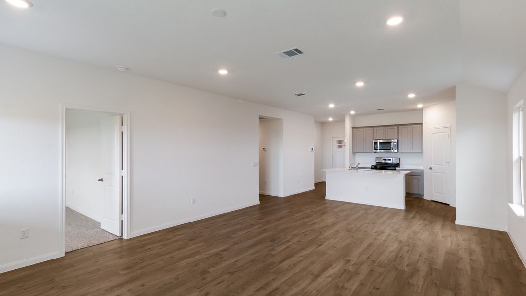 Representative unfurnished interior of a home built from the The Elgin by D.R. Horton in Monarch Ranch, Manor (Image 8). Representative unfurnished interior of a home built from the The Elgin by D.R. Horton in Monarch Ranch, Manor (Image 8).