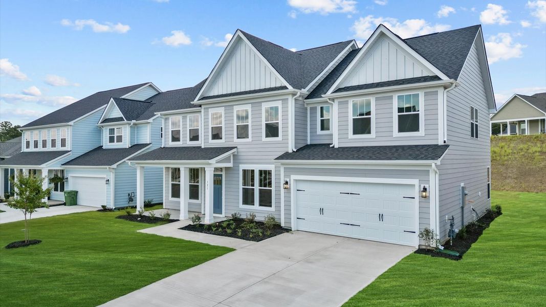 Front exterior of a new home in Wells Crossing, Seneca, SC, highlighting curb appeal (Image 2).