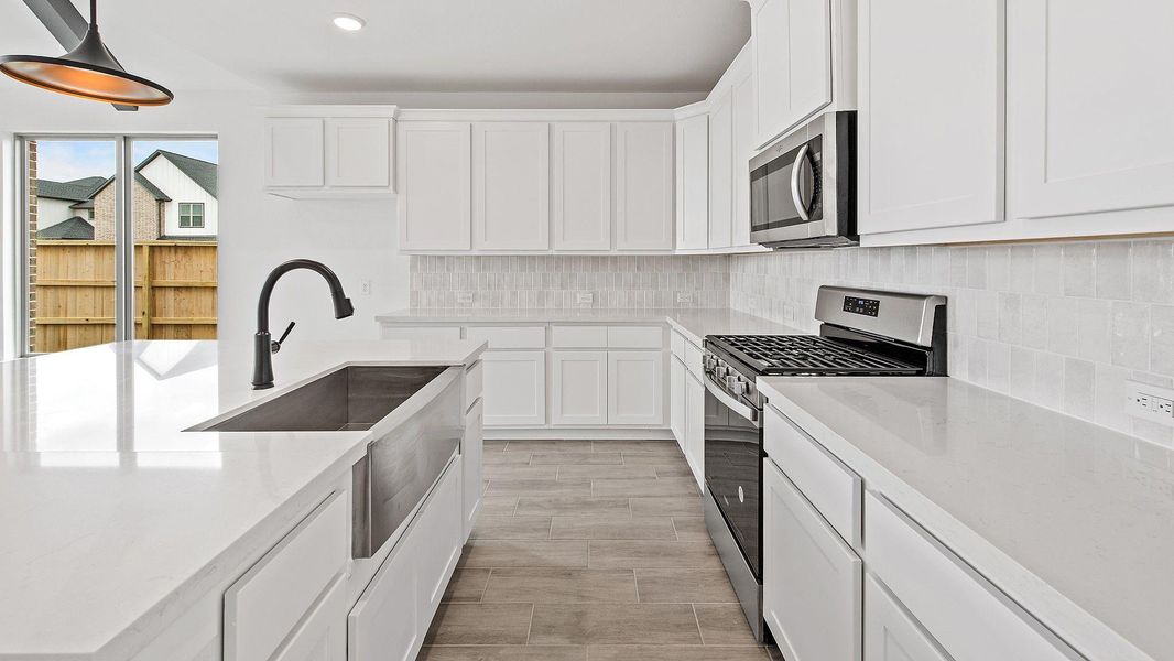 Furnished interior view inside a new home in The Trails, New Caney (Image 6).