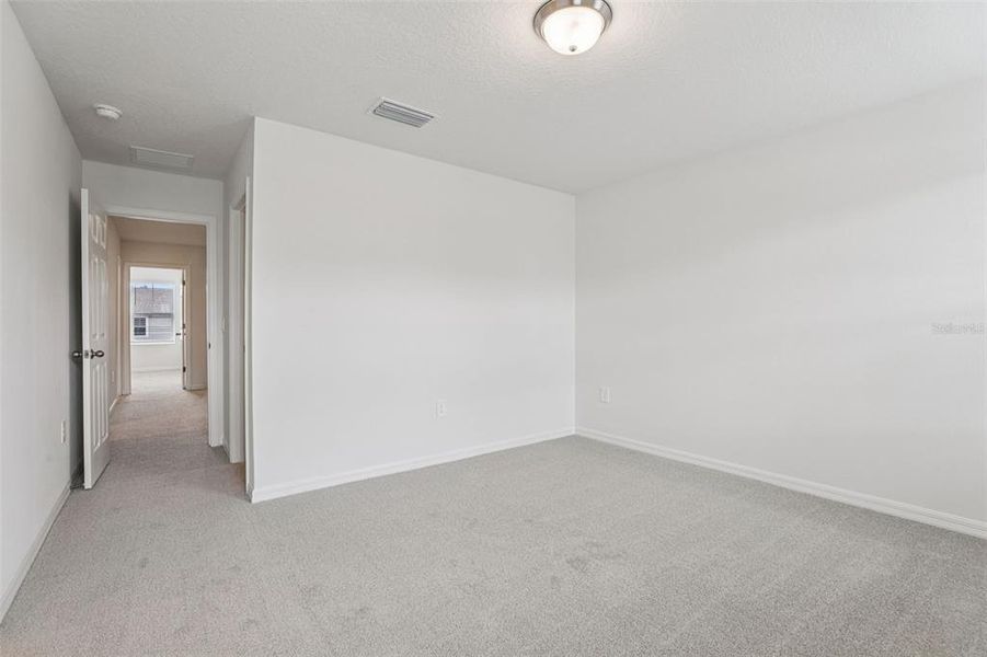 Spacious, unfurnished interior of a new home in Cagan Crossings West, Clermont (Image 22).