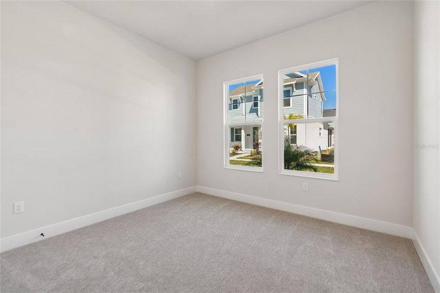 Spacious, unfurnished interior of a new home in Emerald Landing at Waterside at Lakewood Ranch – Cottage Series, Sarasota (Image 34).