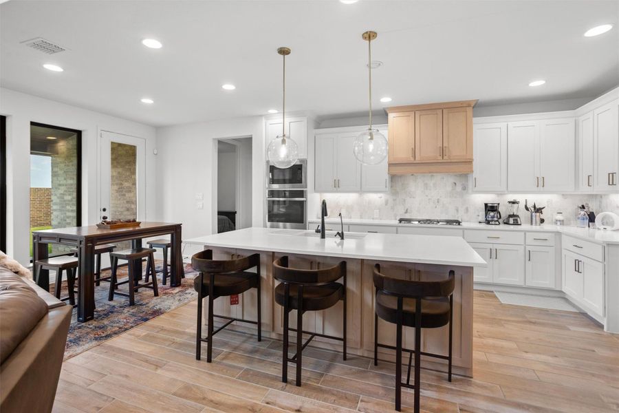 Spacious kitchen centered around an oversized island