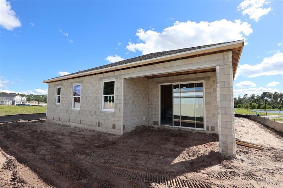 Exterior details and patio area of a home in Bay Lake Farms, St. Cloud (Image 5).