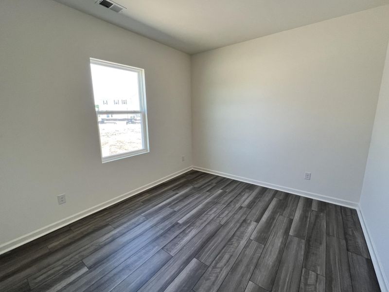 Spacious, unfurnished interior of a new home in Crossing at Givhans, Ridgeville (Image 5).