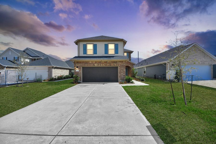 Front exterior of a new home in Marisol, Katy, TX, highlighting curb appeal (Image 2). Front exterior of a new home in Marisol, Katy, TX, highlighting curb appeal (Image 2).