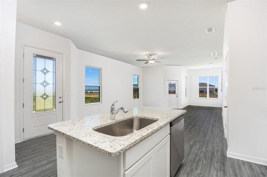 Furnished interior view inside a new home in Sol Vista, Dundee (Image 6).