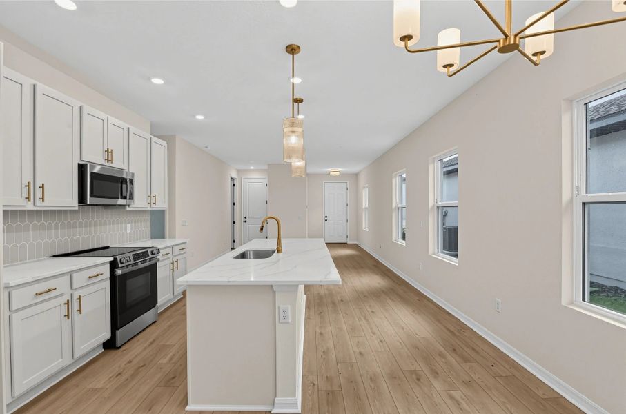 Furnished interior view inside a new home in Catamaran Cove, Rockledge (Image 6).
