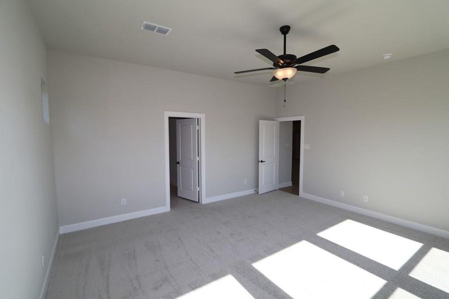 Spacious, unfurnished interior of a new home in Meridiana 55' Homesites, Manvel (Image 7).