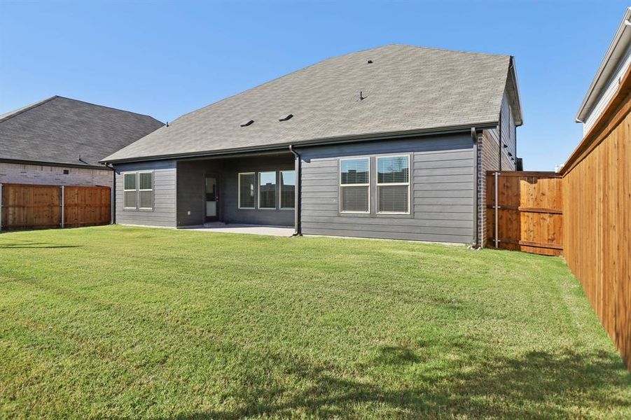 Exterior details and patio area of a home in Lakehaven - Premier Series, Farmersville (Image 2). Exterior details and patio area of a home in Lakehaven - Premier Series, Farmersville (Image 2).