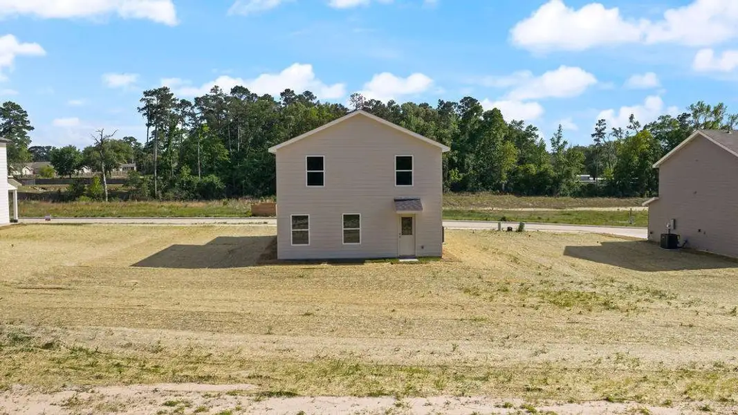 Exterior details and patio area of a home in Stoney Ridge, Hudson (Image 3).