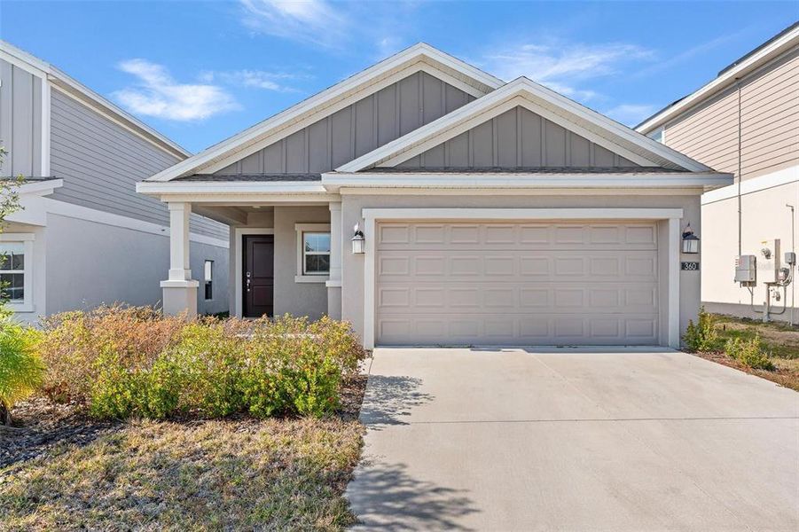 Front exterior of a new home in , Davenport, FL, highlighting curb appeal (Image 2). Front exterior of a new home in , Davenport, FL, highlighting curb appeal (Image 2).