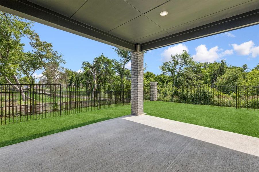 Covered Patio in the Da Vinci II home plan by Trophy Signature Homes – REPRESENTATIVE PHOTO