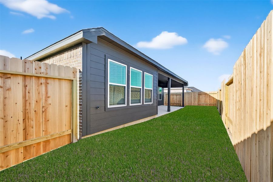 Exterior details and patio area of a home in Rollingbrook Estates, Baytown (Image 19). Exterior details and patio area of a home in Rollingbrook Estates, Baytown (Image 19).
