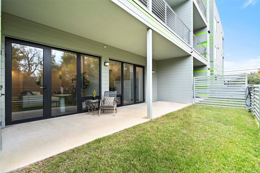 View of yard featuring a patio area and fence