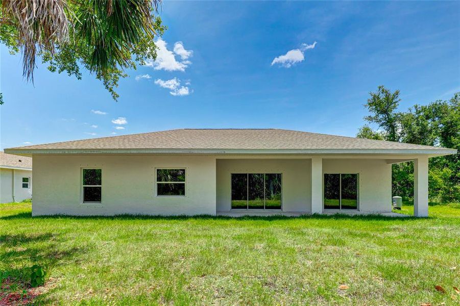 Exterior details and patio area of a home in , North Port (Image 3).