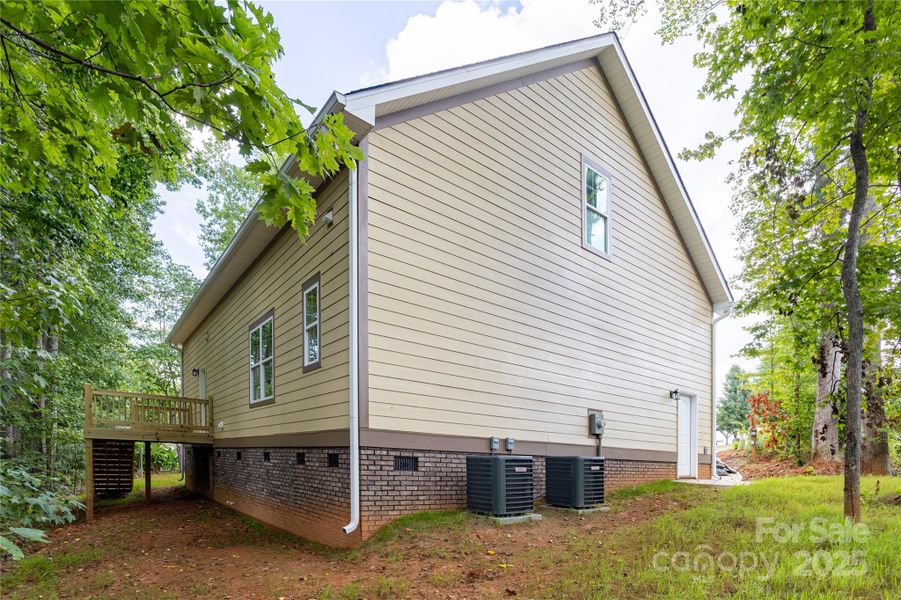 Front exterior of a new home in , China Grove, NC, highlighting curb appeal (Image 1).