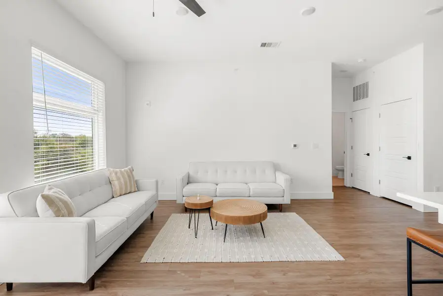 Furnished interior view inside a new home in East Grove Condominiums, Austin (Image 3).