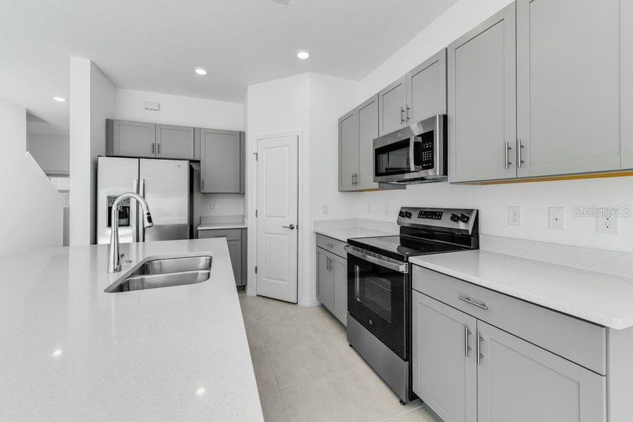 Furnished interior view inside a new home in Vinterra Townhomes, Nokomis (Image 5).