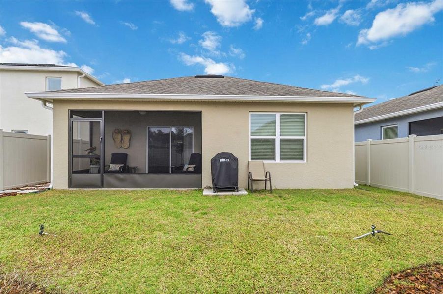 Exterior details and patio area of a home in Harmony West, St. Cloud (Image 28).