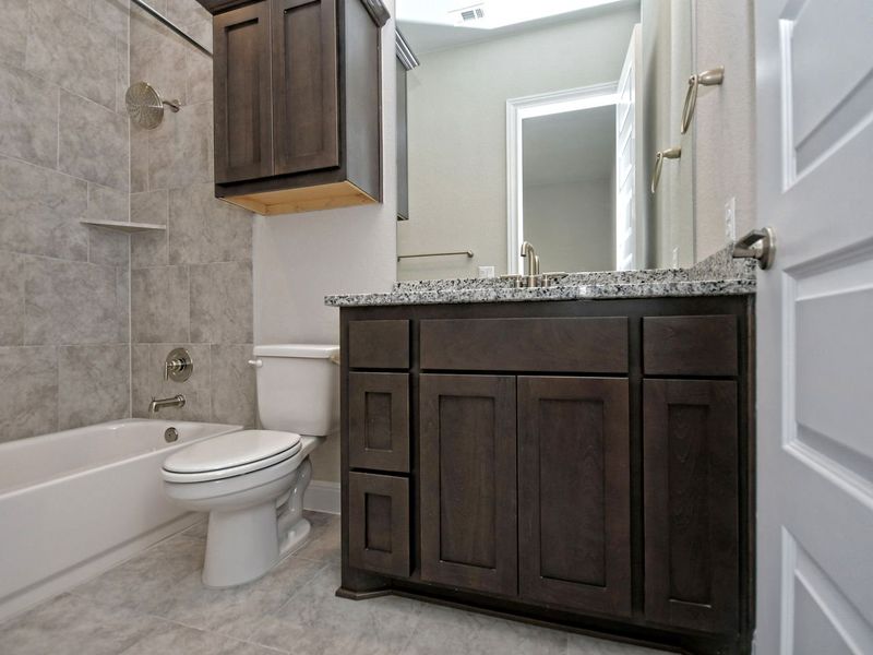 Representative furnished interior of a home built from the Siena III by Giddens Homes in Clearwater Ranch, Liberty Hill (Image 121).