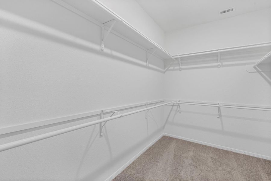A view of your large primary walk-in Closet A view of your large primary walk-in Closet