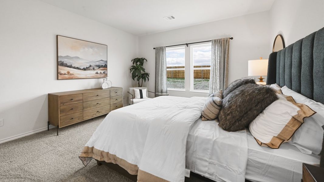 Representative furnished interior of a home built from the Midland by D.R. Horton in Frontier Pointe, Princeton (Image 9).