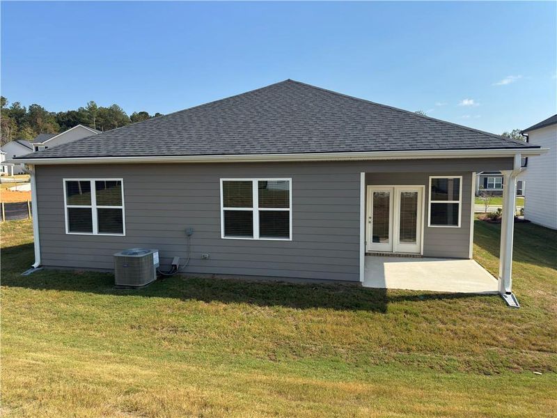 Exterior details and patio area of a home in Oakchase at Hampton, Hampton (Image 17).