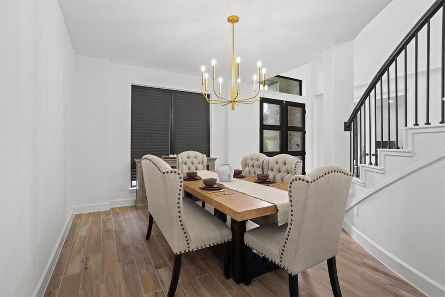 Formal dining positioned just off the entry