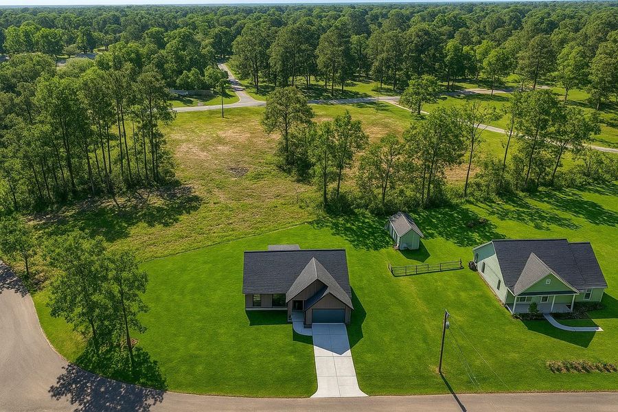 Aerial view of Virtually staged with drive - grass Aerial view of Virtually staged with drive - grass