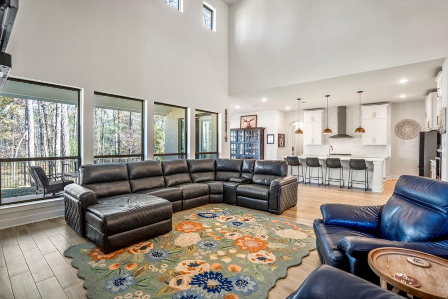 Appreciate the high ceilings and large windows offering natural light and forest views. It includes a modern open-plan design that's perfect to call home.