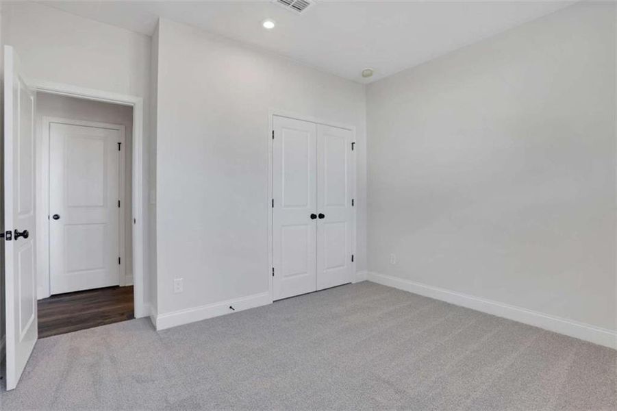 Spacious, unfurnished interior of a new home in The Paddocks at Doc Hughes, Buford (Image 20).