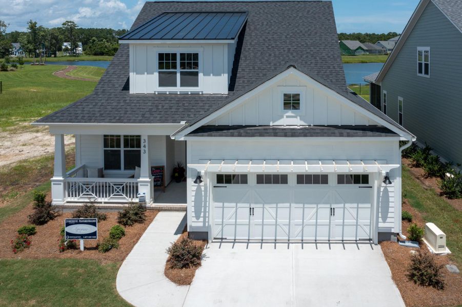 Representative exterior photo of a completed home built from the Fletcher by Bill Clark Homes in Riverside Cove, Wilmington, NC (Image 29).