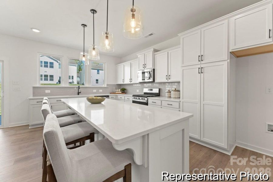 Furnished interior view inside a new home in , Wingate (Image 4).