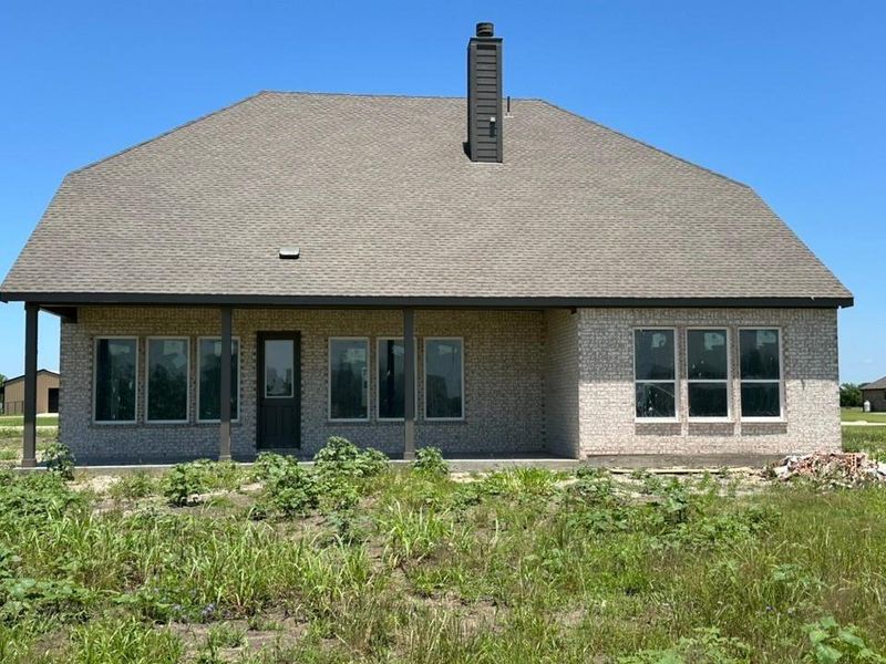 Exterior details and patio area of a home in Fannin Ranch, Leonard (Image 3).