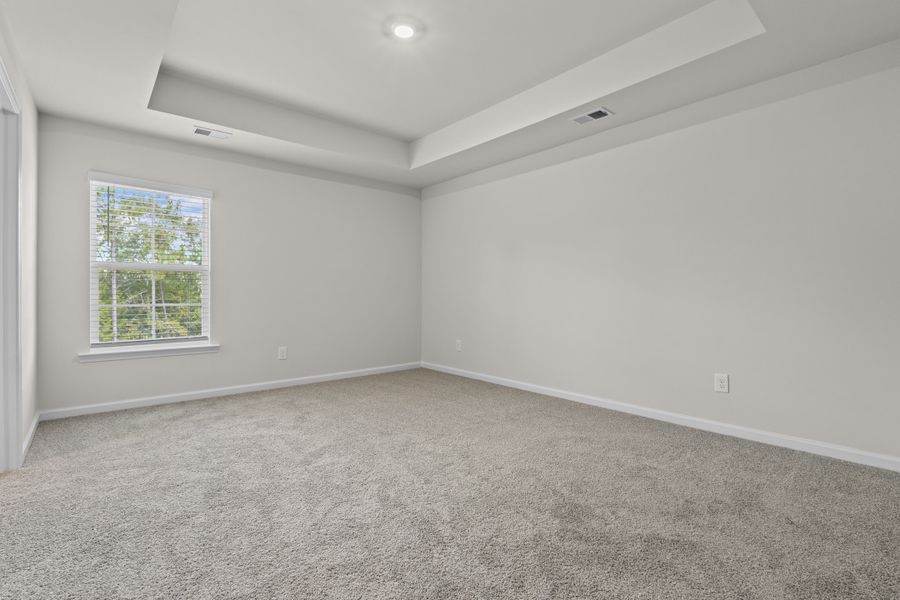 Representative unfurnished interior of a home built from the Cedar A by McGuinn Homes in Forts Ridge, Pelion (Image 18).