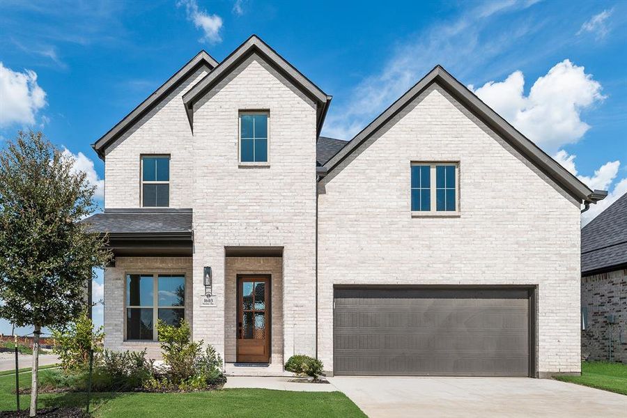Front exterior of a new home in Devonshire, Heath, TX, highlighting curb appeal (Image 26).