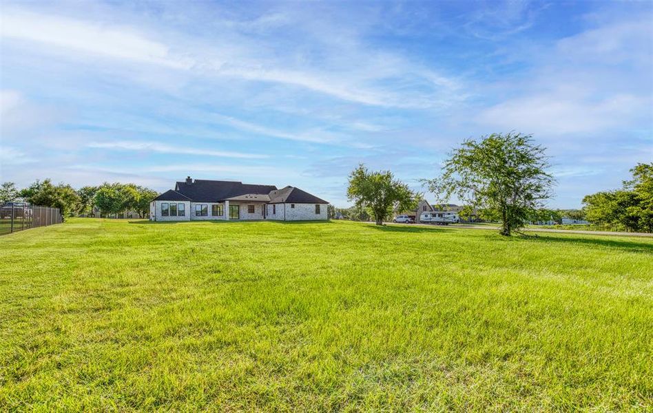 Front exterior of a new home in , Wills Point, TX, highlighting curb appeal (Image 2).