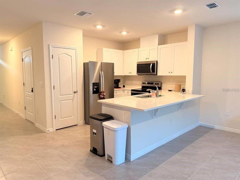 Furnished interior view inside a new home in , Davenport (Image 8).