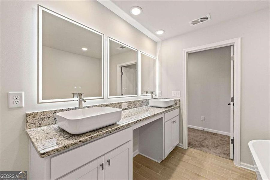 Furnished interior view inside a new home in The Grove At Mundy Mill, Gainesville (Image 5).