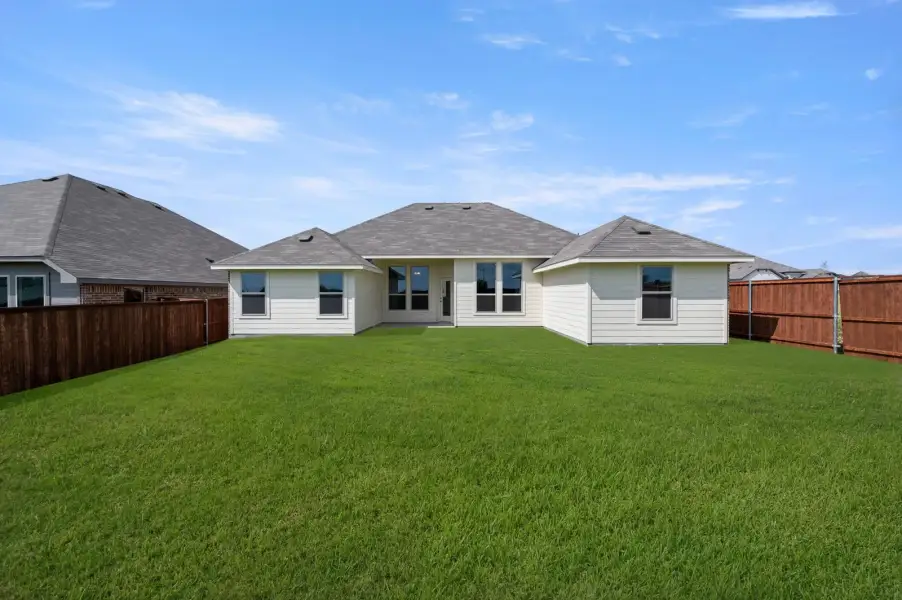 Front exterior of a new home in Still Water Lake Estates, Godley, TX, highlighting curb appeal (Image 27).