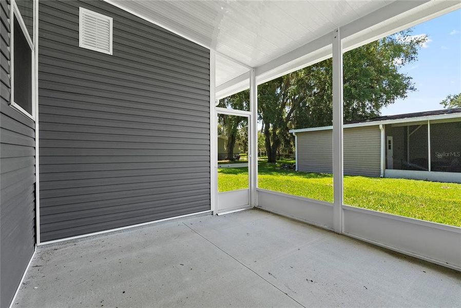 Exterior details and patio area of a home in , Astatula (Image 22).