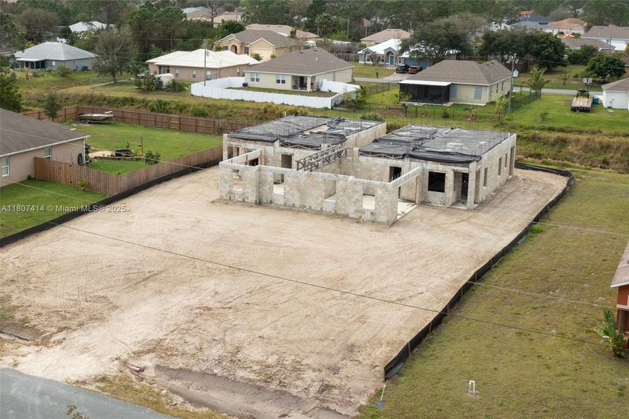 Front exterior of a new home in , Palm Bay, FL, highlighting curb appeal (Image 12).