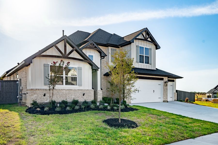 Front exterior of a new home in Stella Ranch, Bryan, TX, highlighting curb appeal (Image 25).